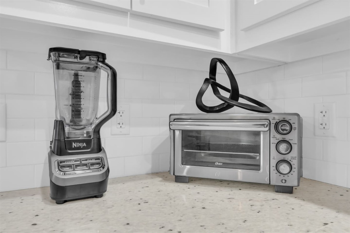 Countertop appliances including blender and toaster oven for easy meals.