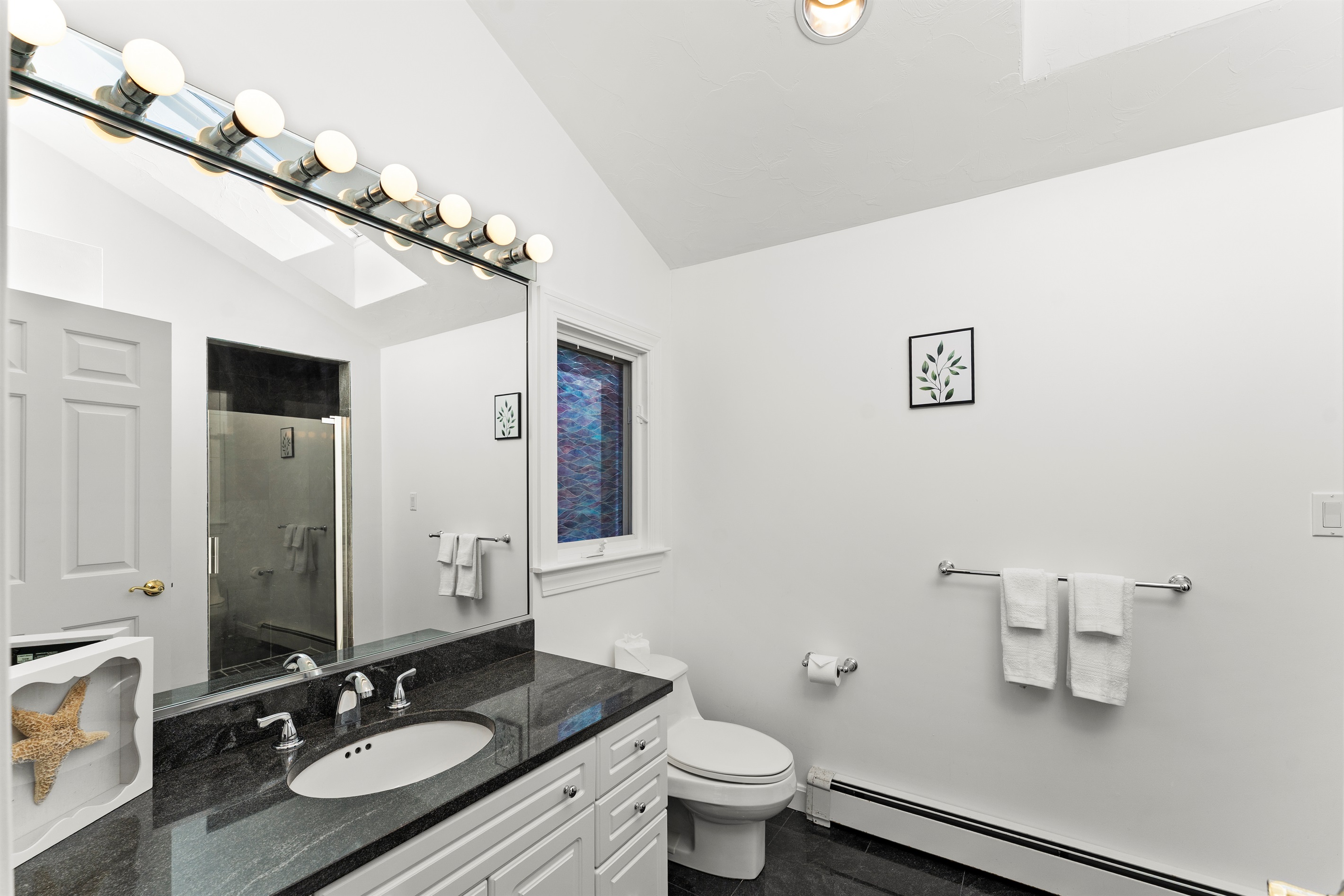 Private ensuite bathroom for comfort and convenience.