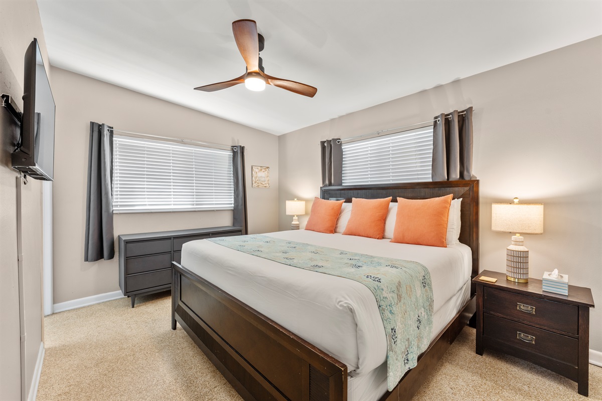 Primary bedroom with a King bed and TV