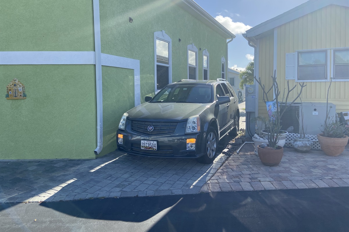 Parking for 2 medium cars. Trucks/large SUVs are parked at the overflow lot.
