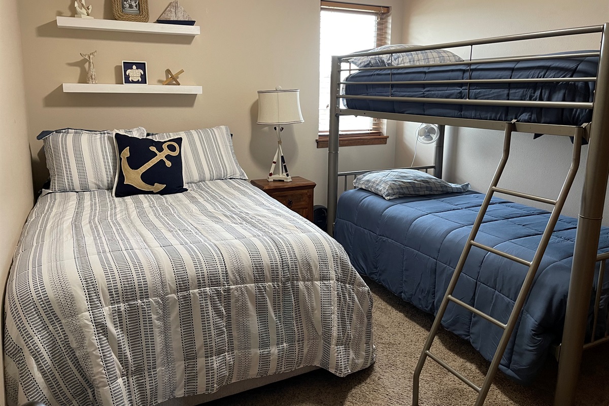 Guest room with full bed and twin/twin bunk bed