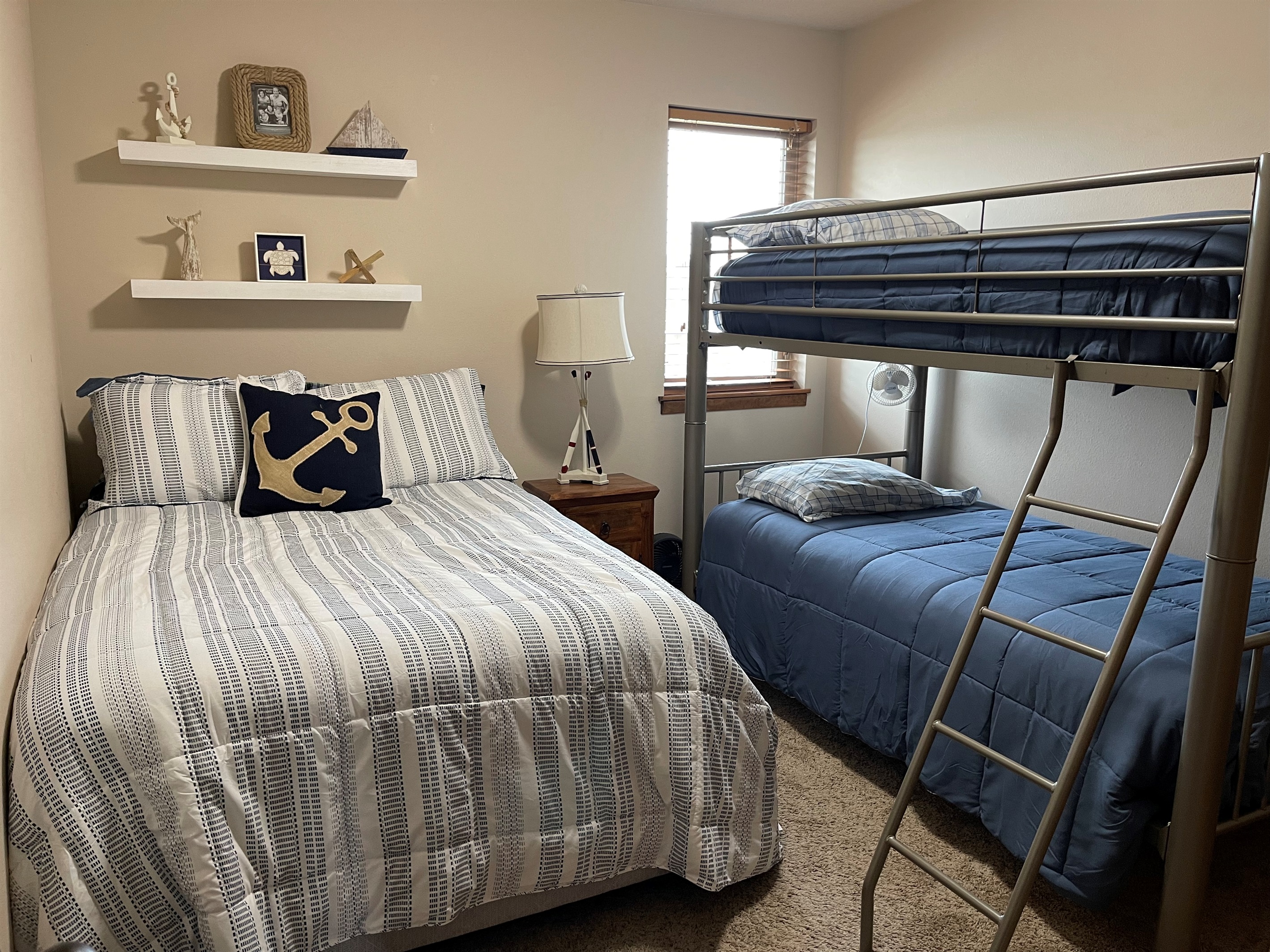 Guest room with full bed and twin/twin bunk bed