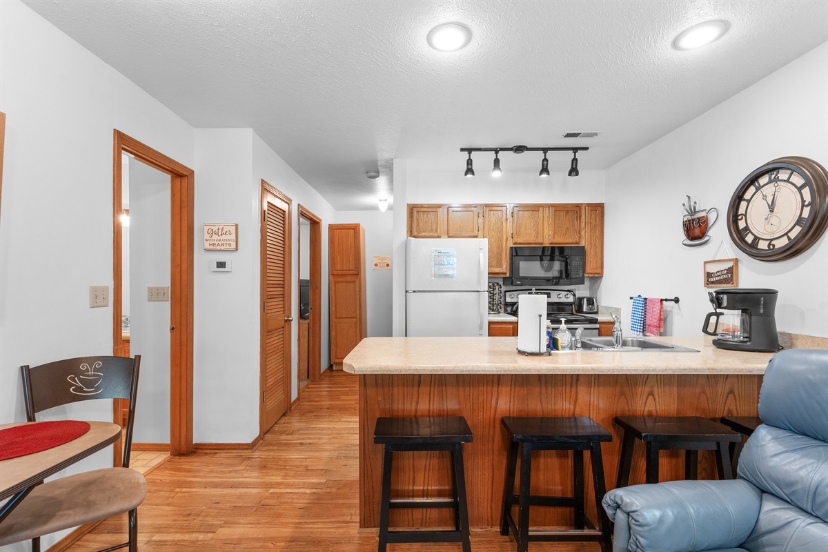 The vaulted layout keeps the condo feeling open while still giving each bedroom its own space.