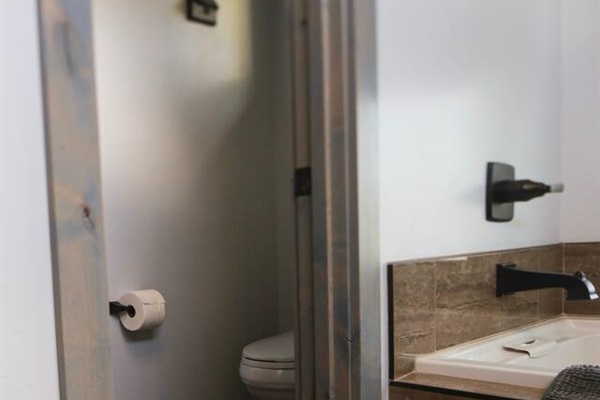 water closet with master toilet