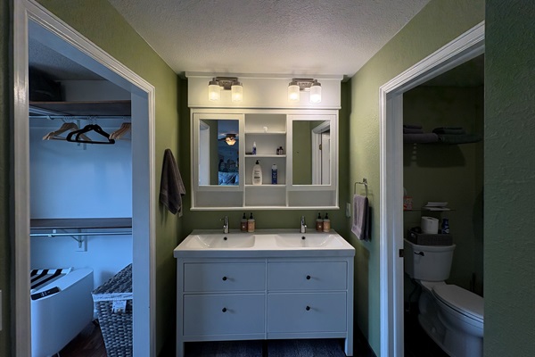 WC1 — Ruck Room ensuite 3/4 bath with double sink.