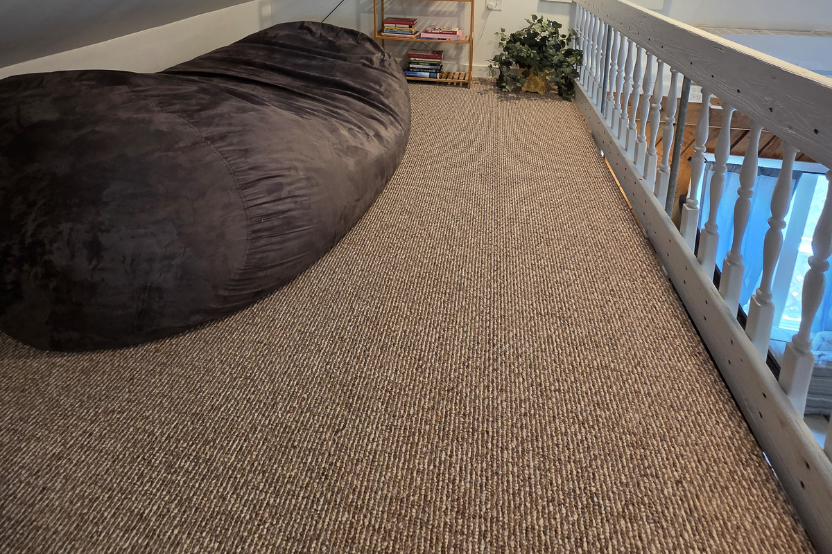 The bookshelf up to is always being filled with more books and games! A giant beanbag chair makes a perfect reading spot!