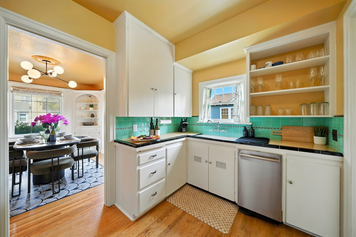 Charming, compact kitchen with a vintage, electric range.