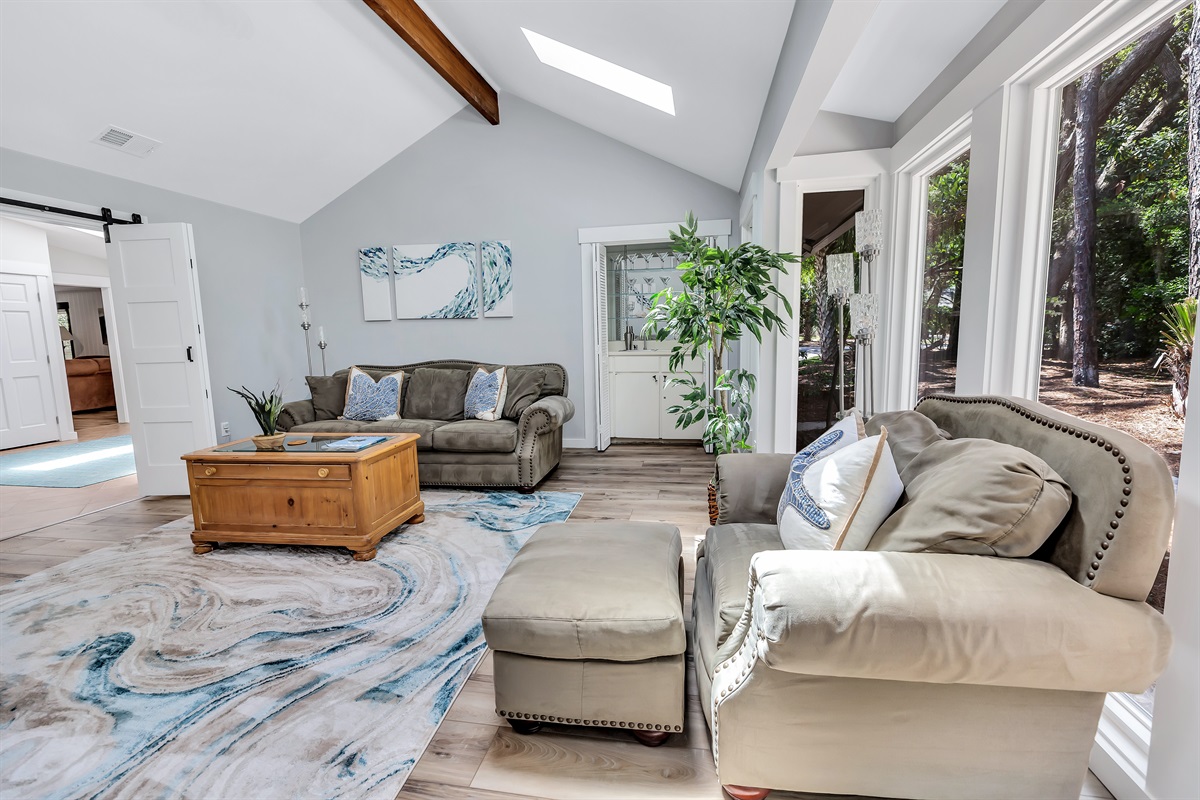 Large living room with barn doors for privacy