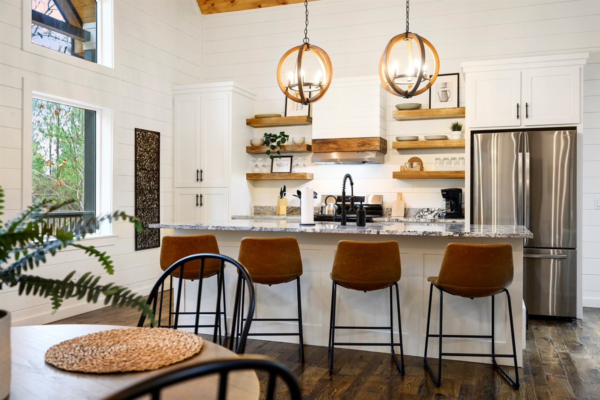Bright, cozy, and ready for everything from brunch spreads to midnight snacks. 
Because the best cabin kitchens are not just for cooking, they’re where everyone somehow ends up gathering.