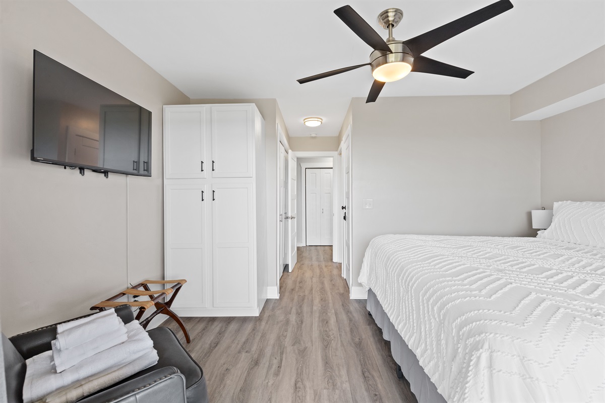 Spacious king bedroom with modern finishes and ample storage