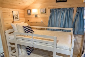 Bunk twin bed with white linings