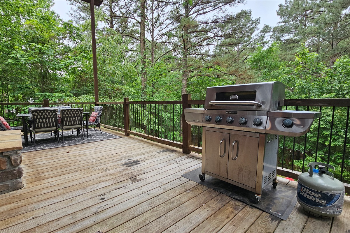 Deck with Grill: Sizzle up dinner while soaking in serene forest views on your private deck!