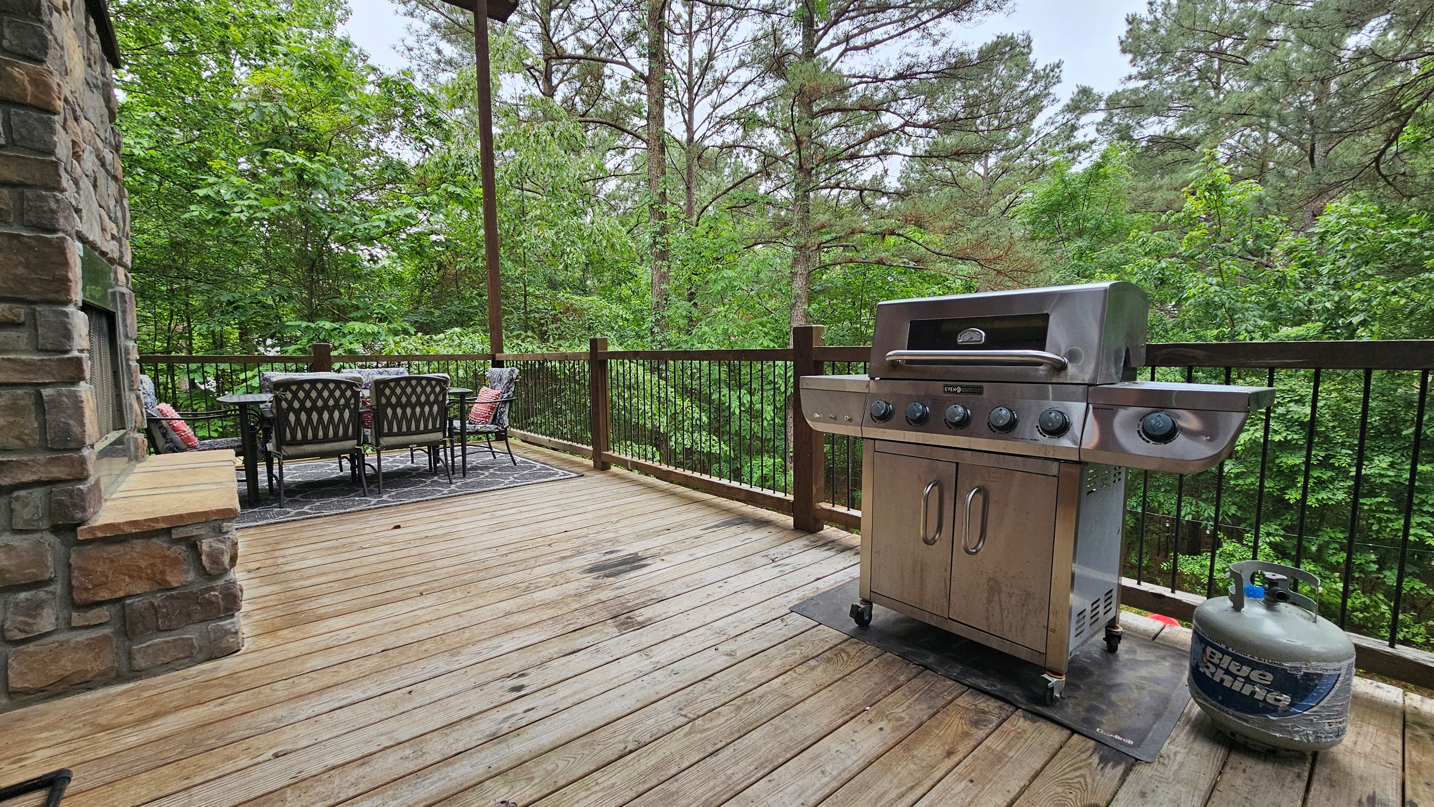 Deck with Grill: Sizzle up dinner while soaking in serene forest views on your private deck!