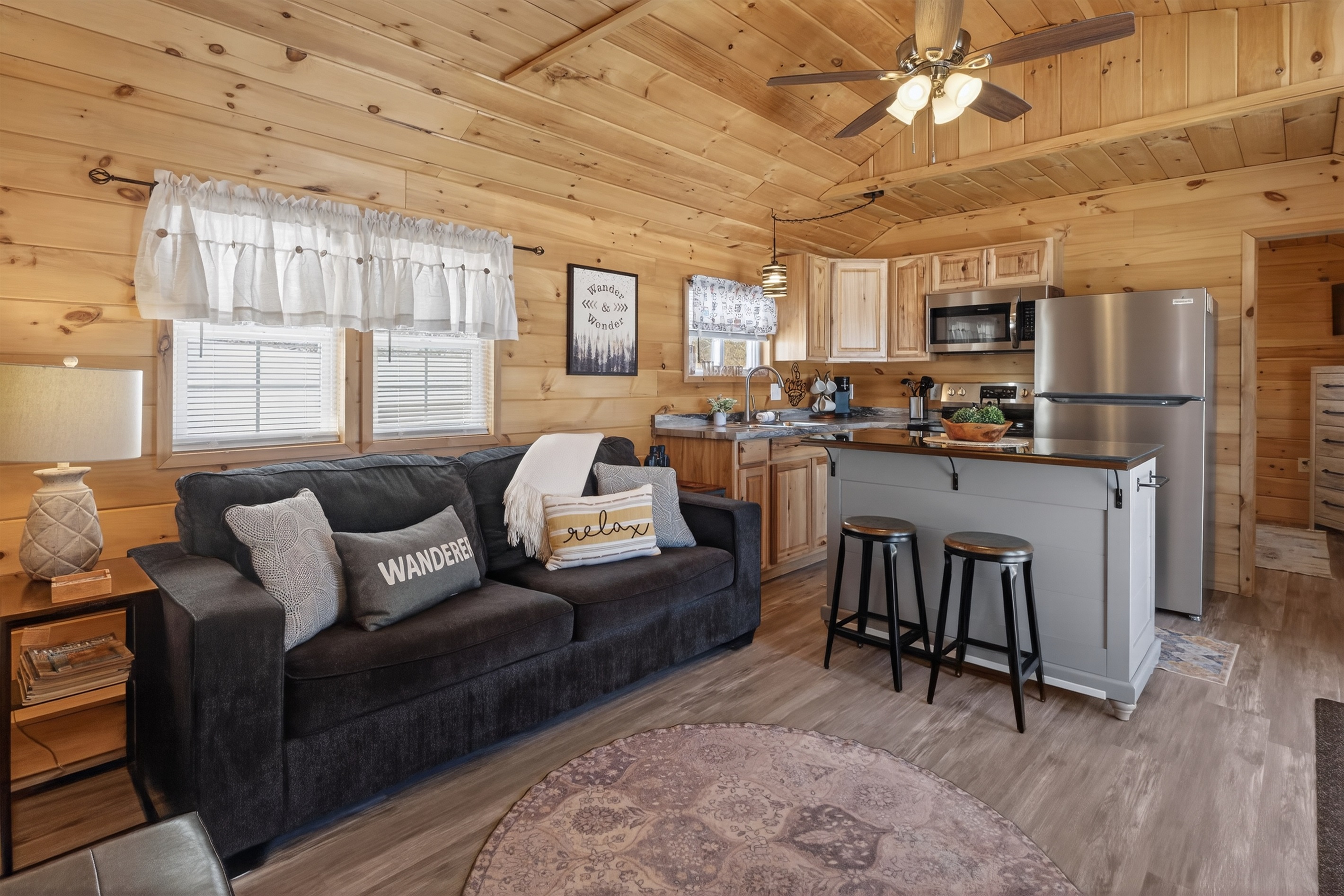 Fold out sofa and kitchen in the tiny home