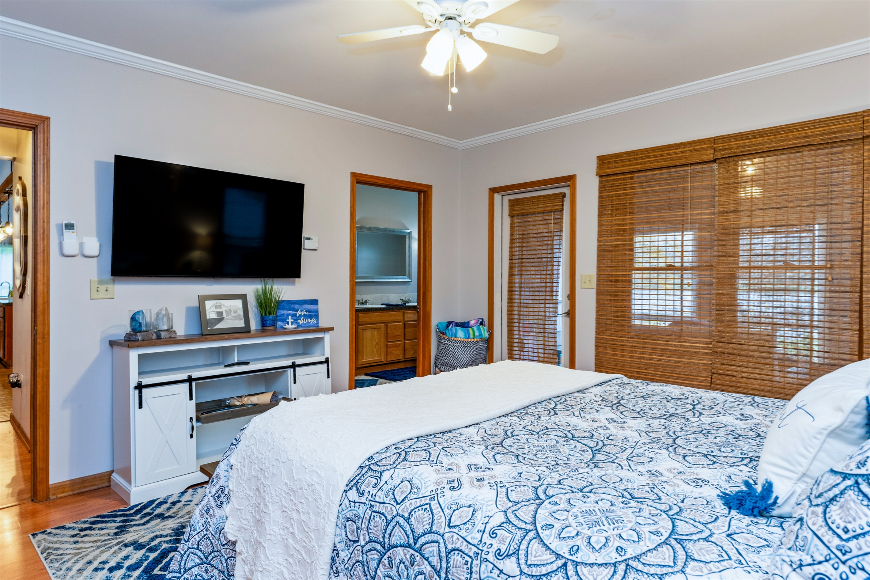 Queen master bedroom with en suite bathroom and private side screen porch-main floor