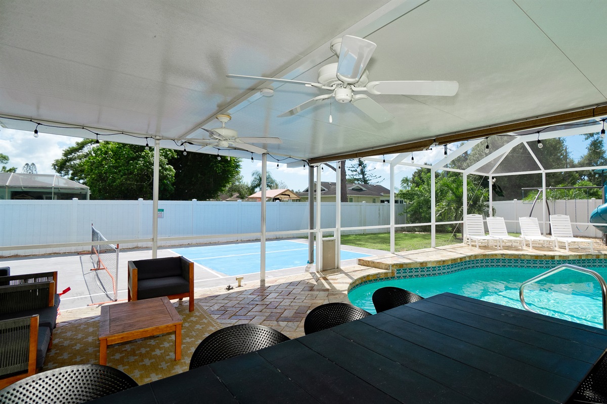 Unwind in the shade of the lanai, take a dip in the sparkling pool, or challenge your friends to a pickleball match — all just steps apart in your private paradise.