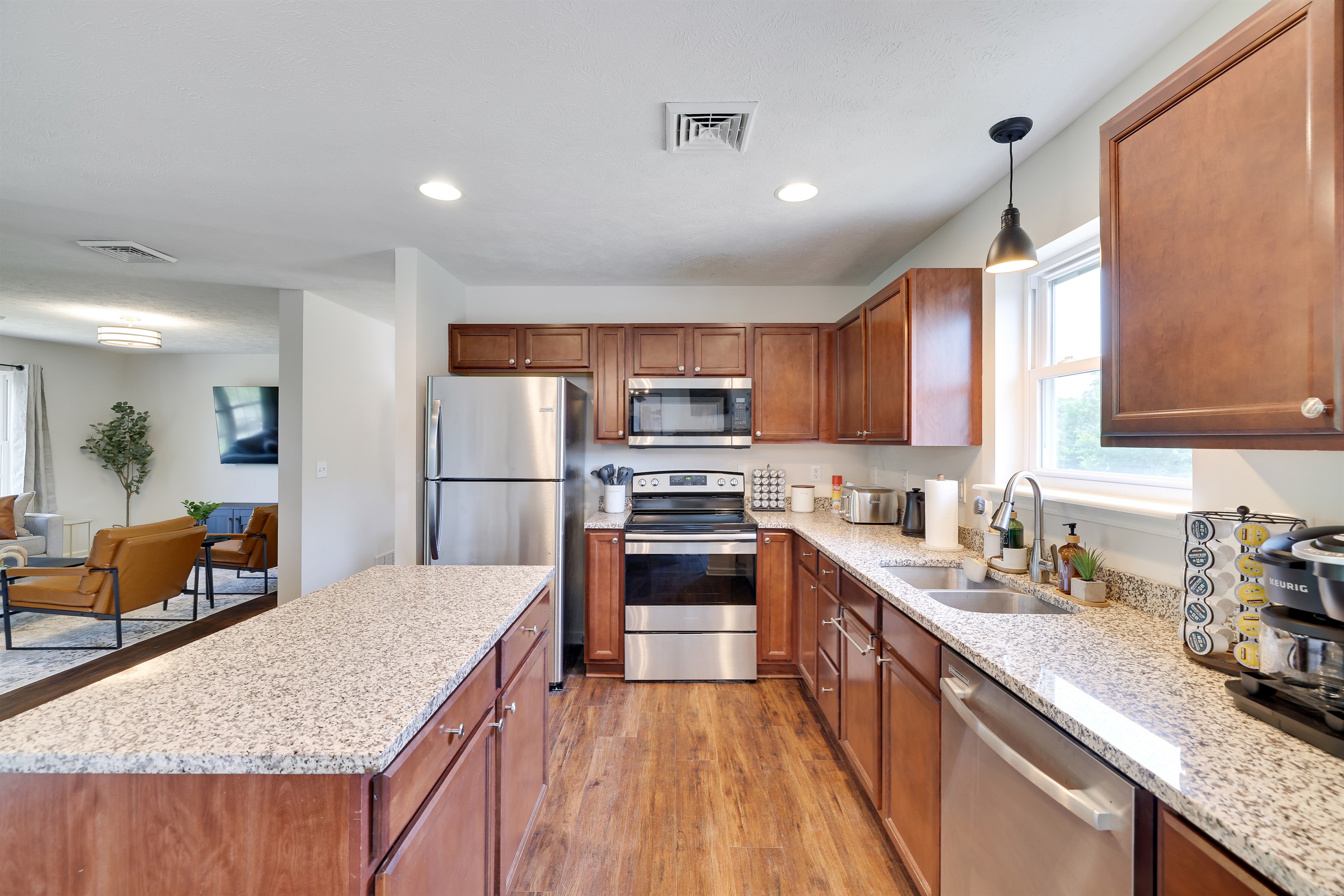With modern cooking appliances and spacious countertops, the kitchen has it all!