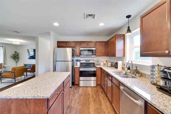 With modern cooking appliances and spacious countertops, the kitchen has it all!