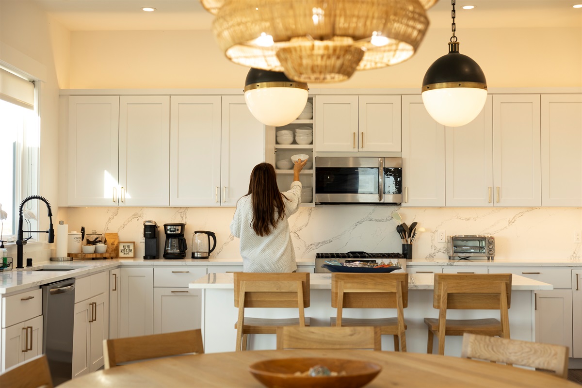 {Kitchen} Designed for real cooking — top-of-the-line cookware, stocked spices, containers, and everything you need to make meals feel like home.