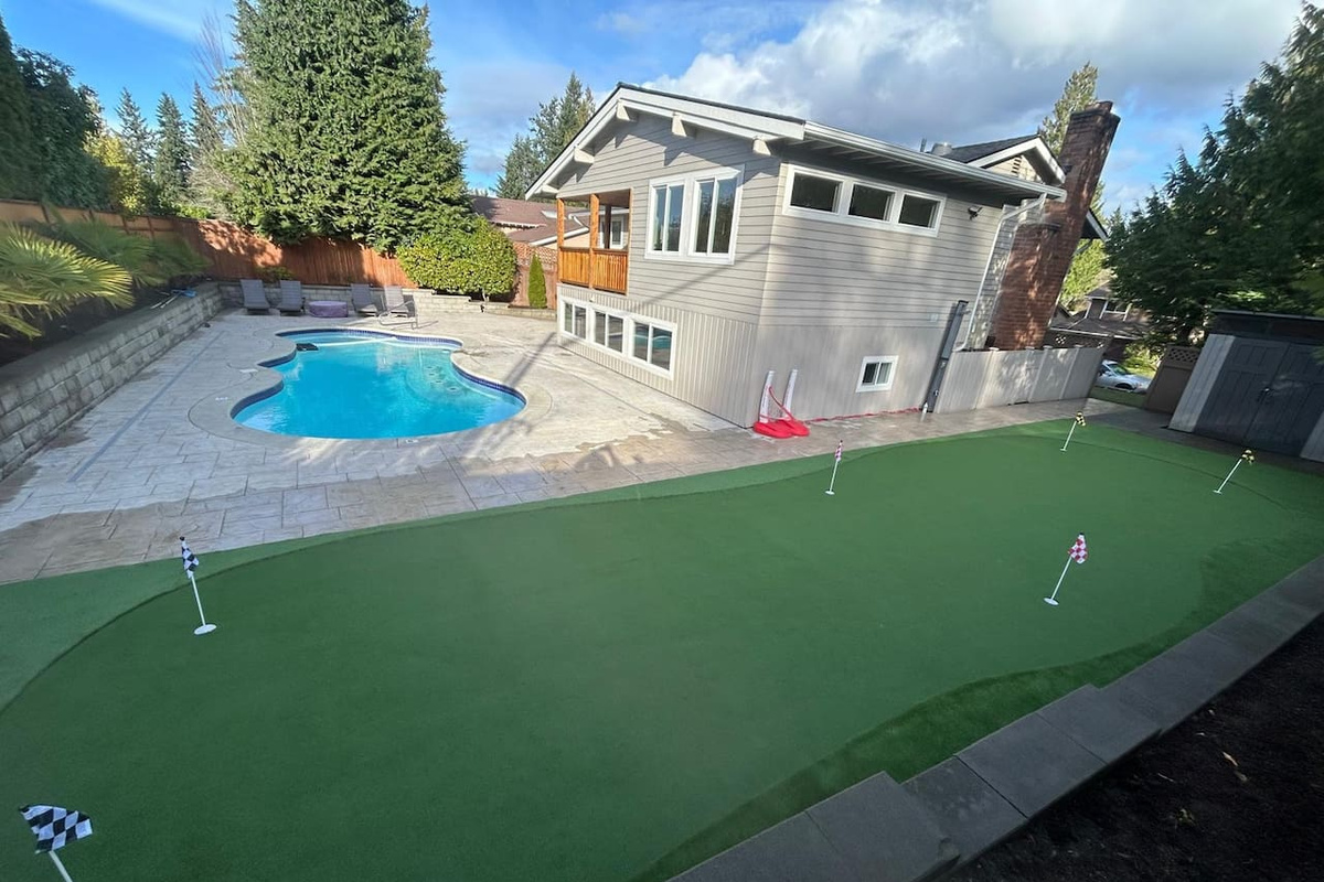 NEW! “Enjoy the best of both worlds—our backyard oasis features a sparkling private pool and a fun mini-golf course, perfect for families and groups.”