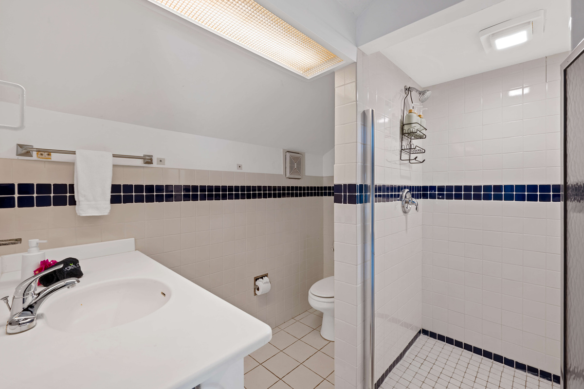 A private loft bathroom adds extra comfort and convenience for your stay.