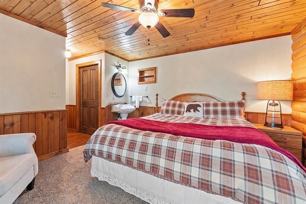 Lower level bedroom with king bed