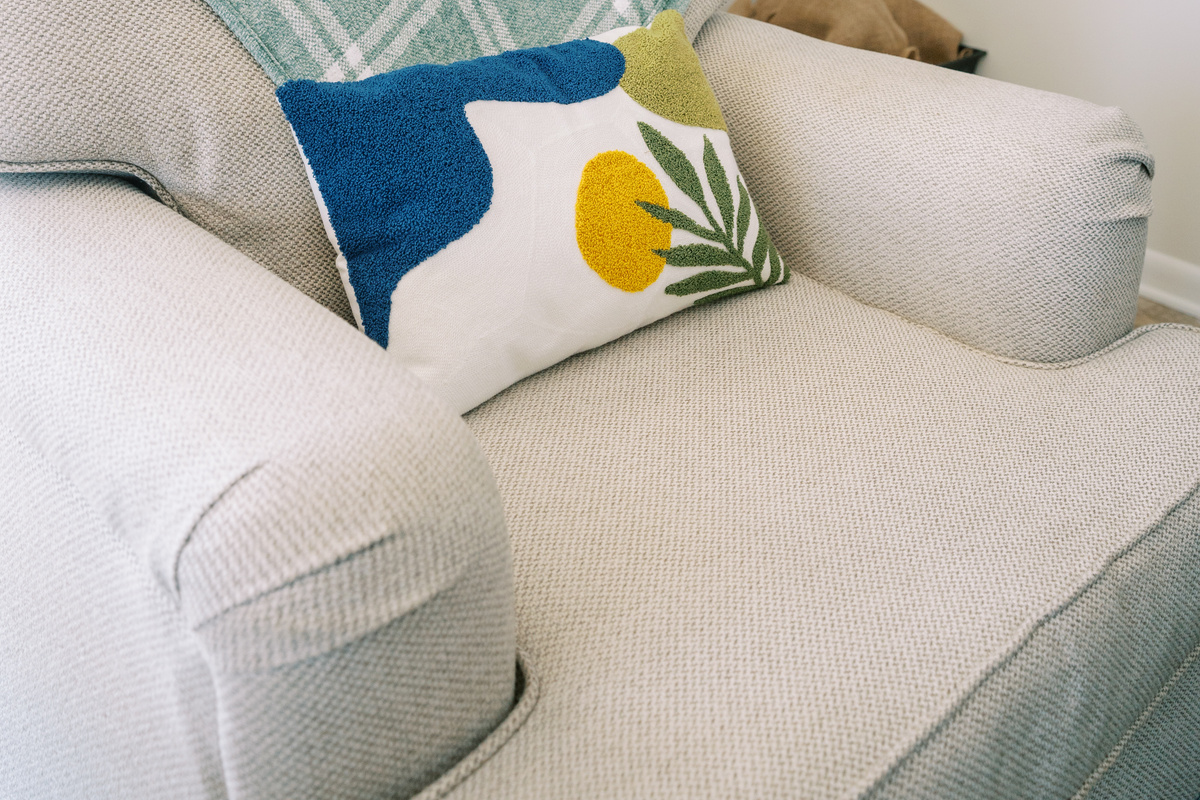 Large cozy reading chair, or ocean-viewing chair (in the A/C! ❄️)