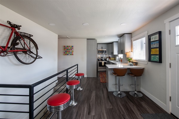Entry looking towards kitchen and hall to bedrooms