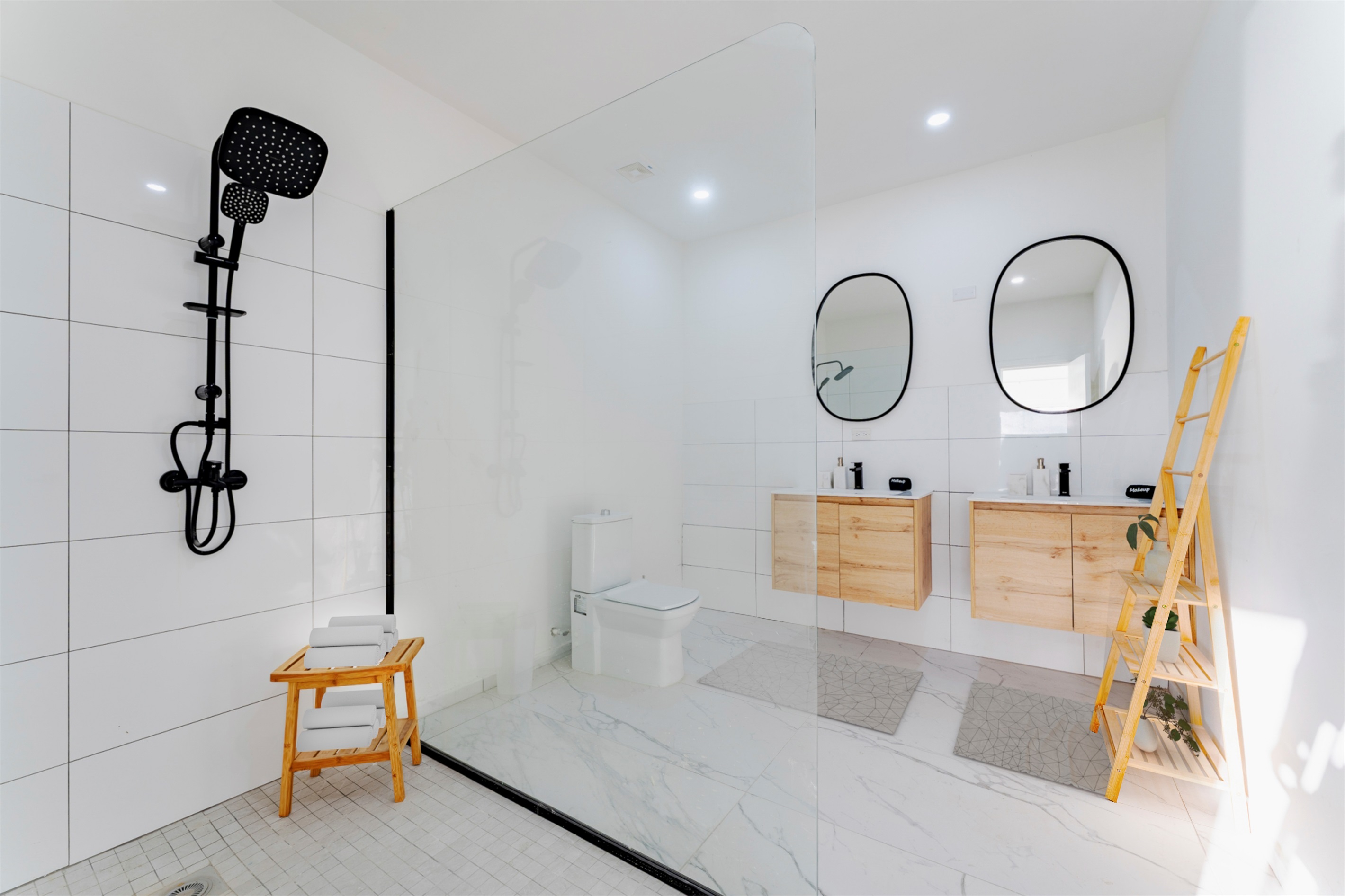 Spa-Inspired Primary Bathroom with Double Vanities & Walk-In Rainfall Shower