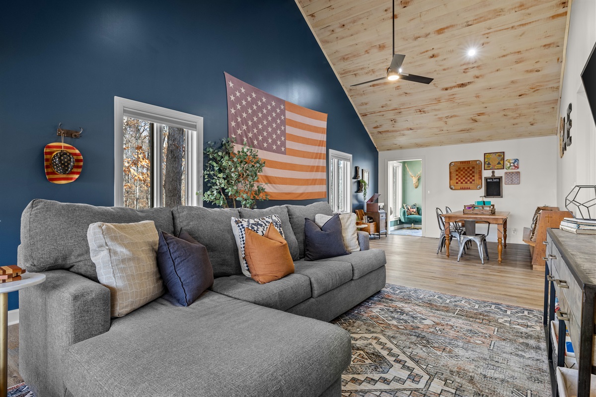 Back living room with cozy sectional.