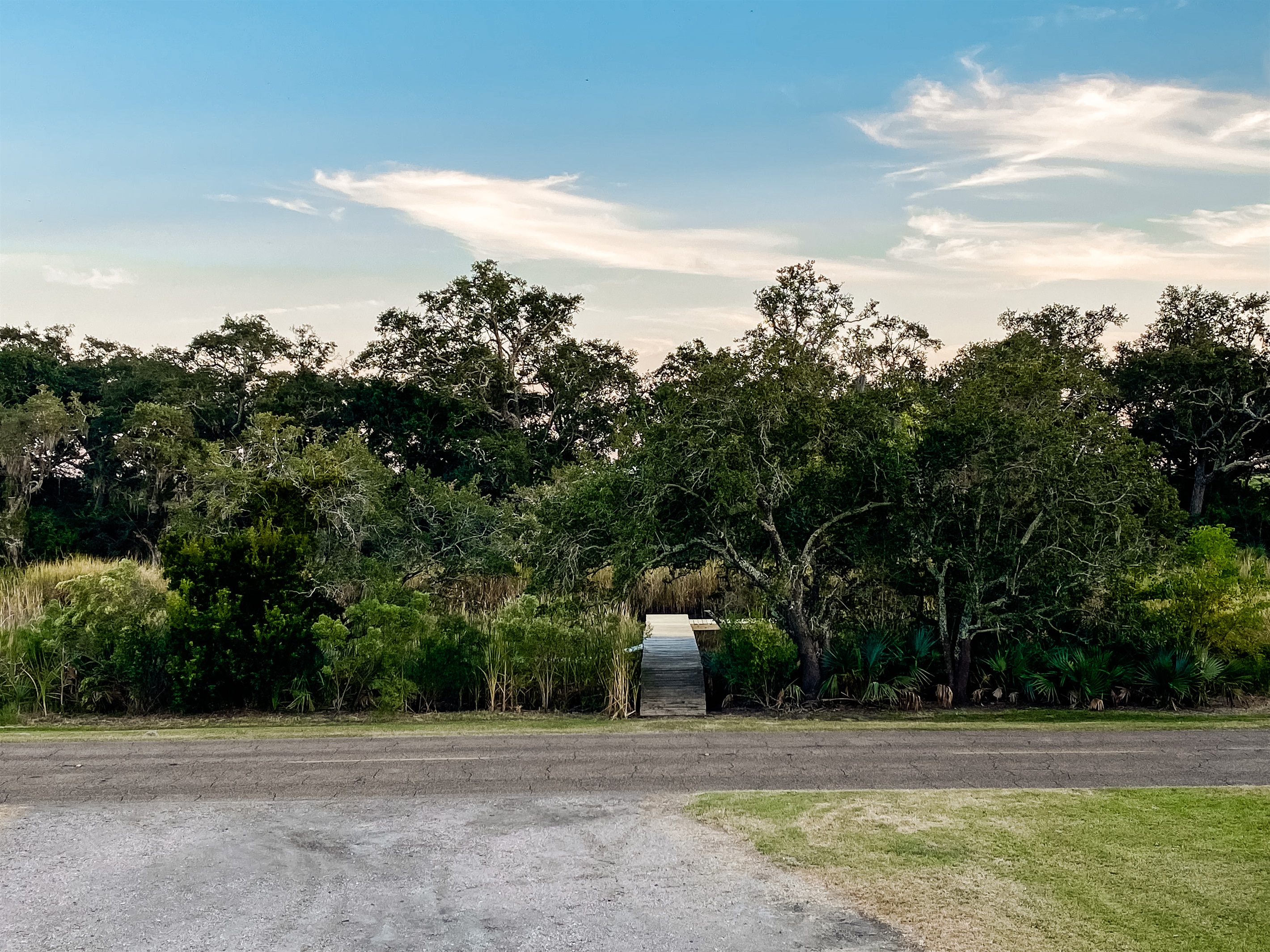 View of the private pier from the front porch.