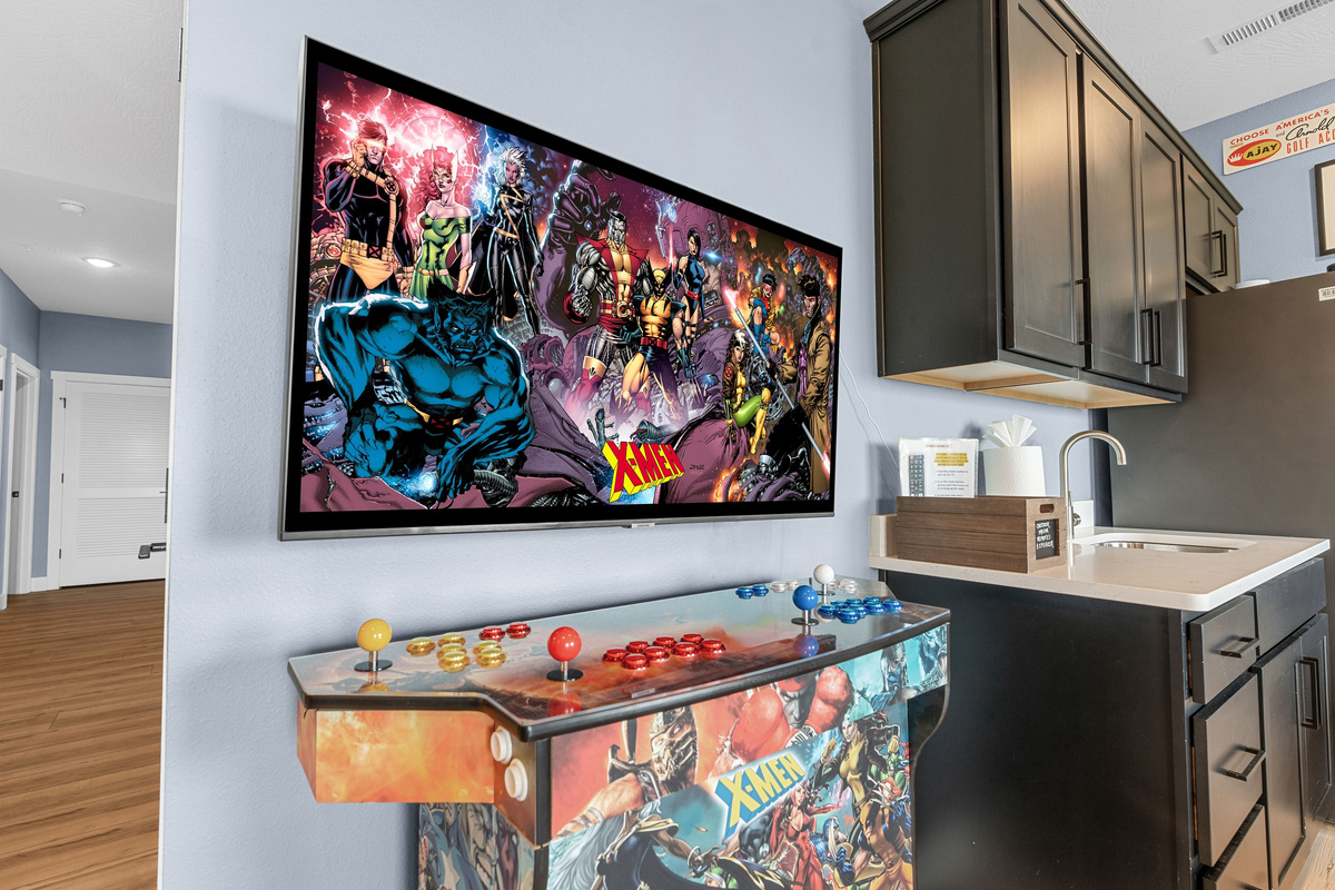 4-player Arcade System On a large 43" TV Screen with thousands of arcade games