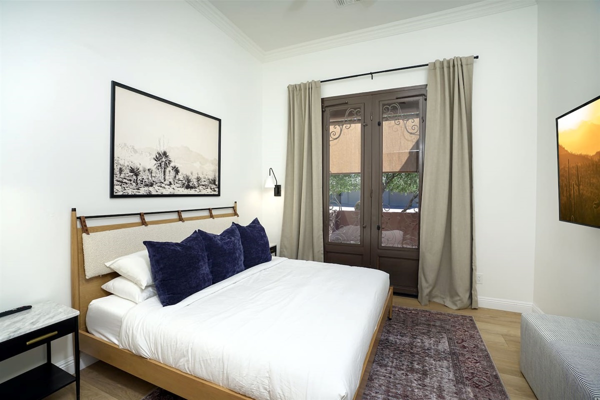 Third bedroom with seating area located directly off the bedroom.