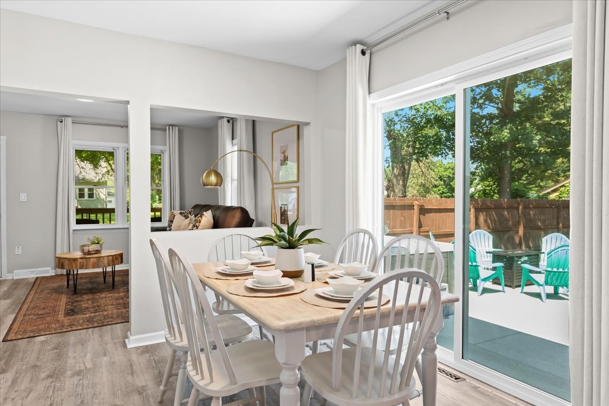 Dining area with seating for six, overlooking the backyard