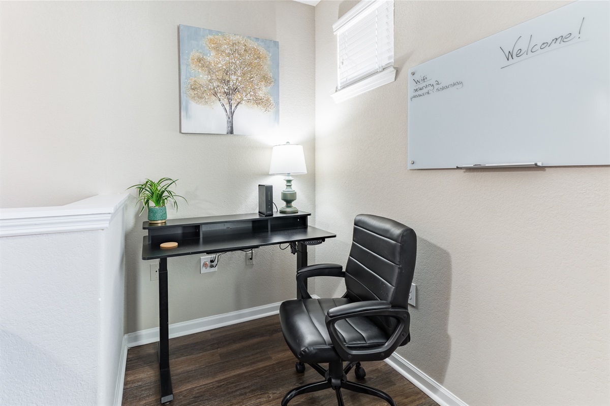 workspace desk with whiteboard