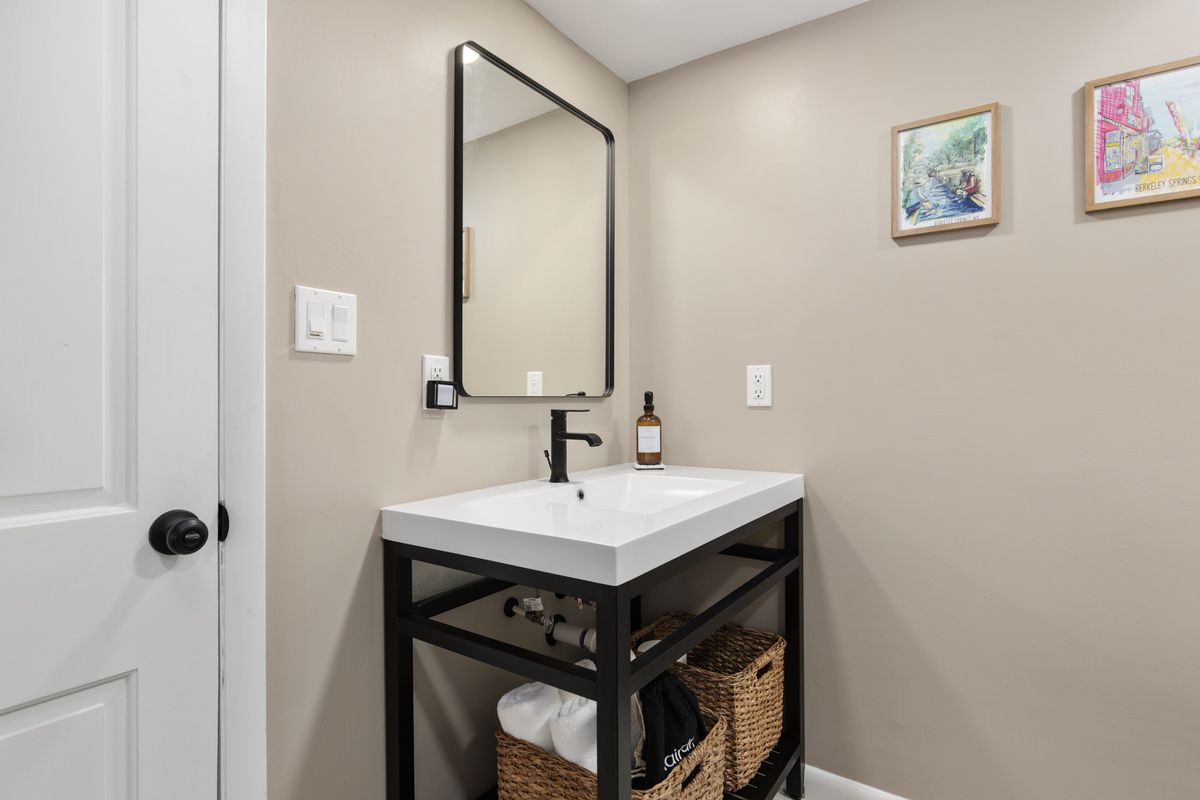 A second bath with a walk-in shower — perfect for busy mornings when everyone's getting ready at once.