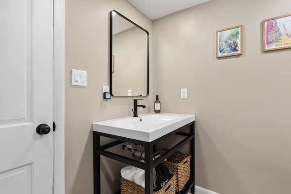 A second bath with a walk-in shower — perfect for busy mornings when everyone's getting ready at once.