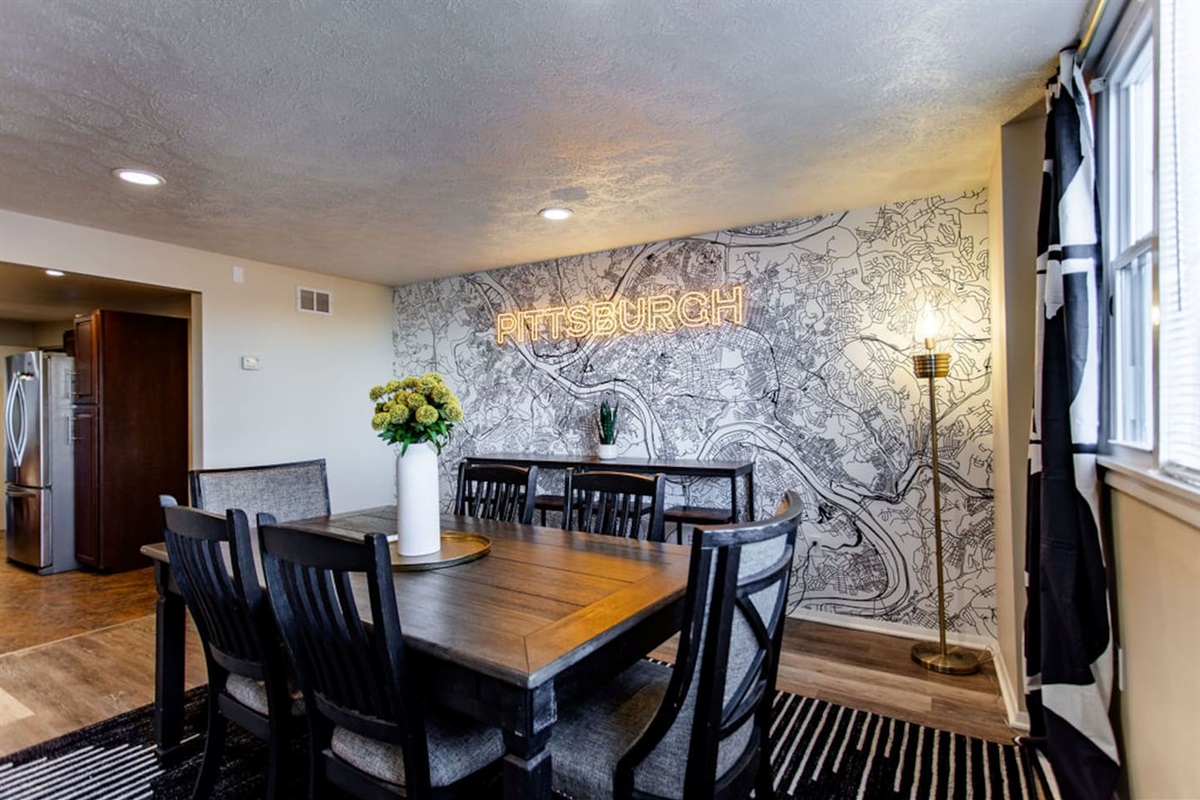 Charming 6-seater dining table, perfect for intimate meals or casual gatherings in a cozy and welcoming space.