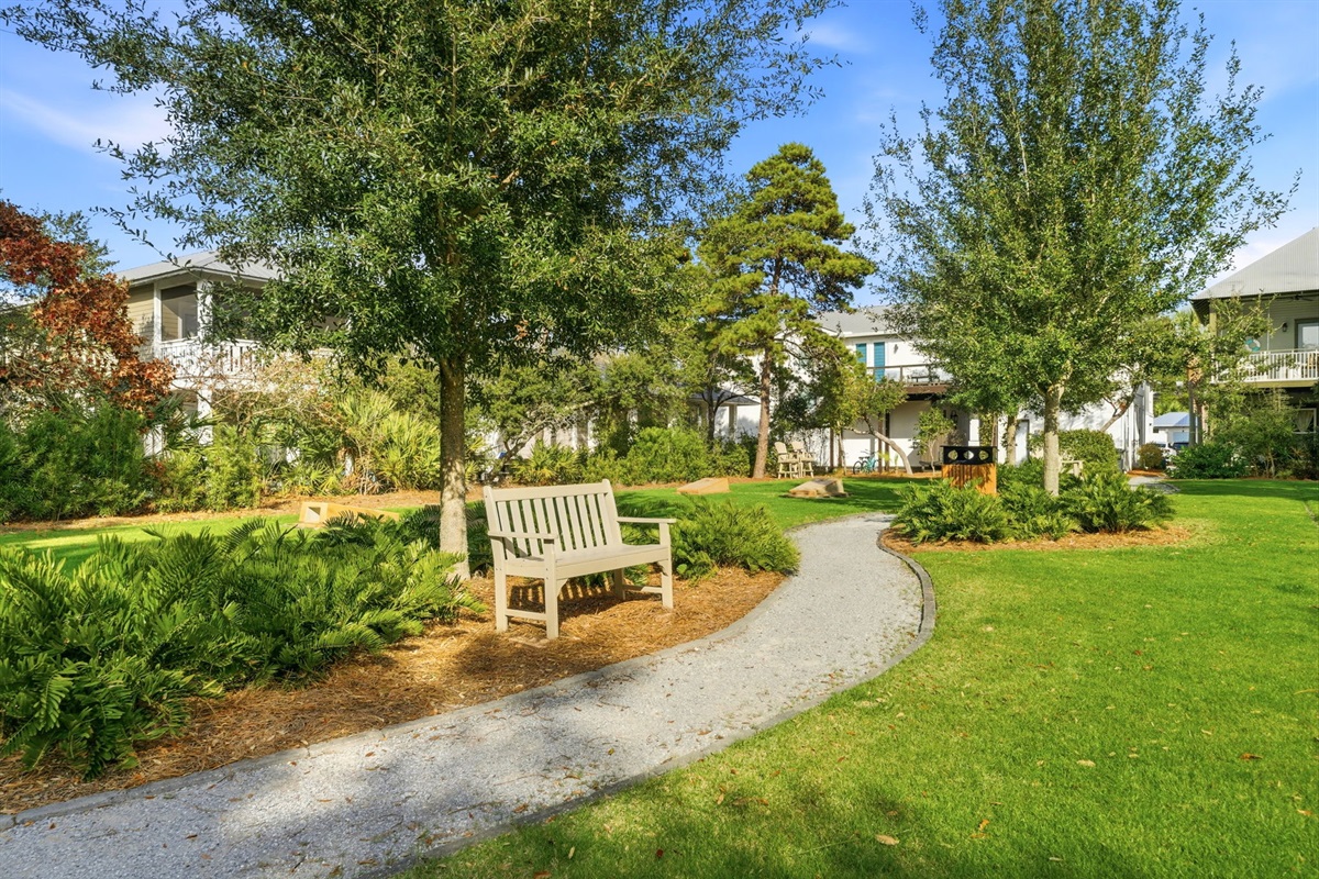 The perfect spot to pause and soak in the sun, shade or beautiful landscaping of Seacrest.