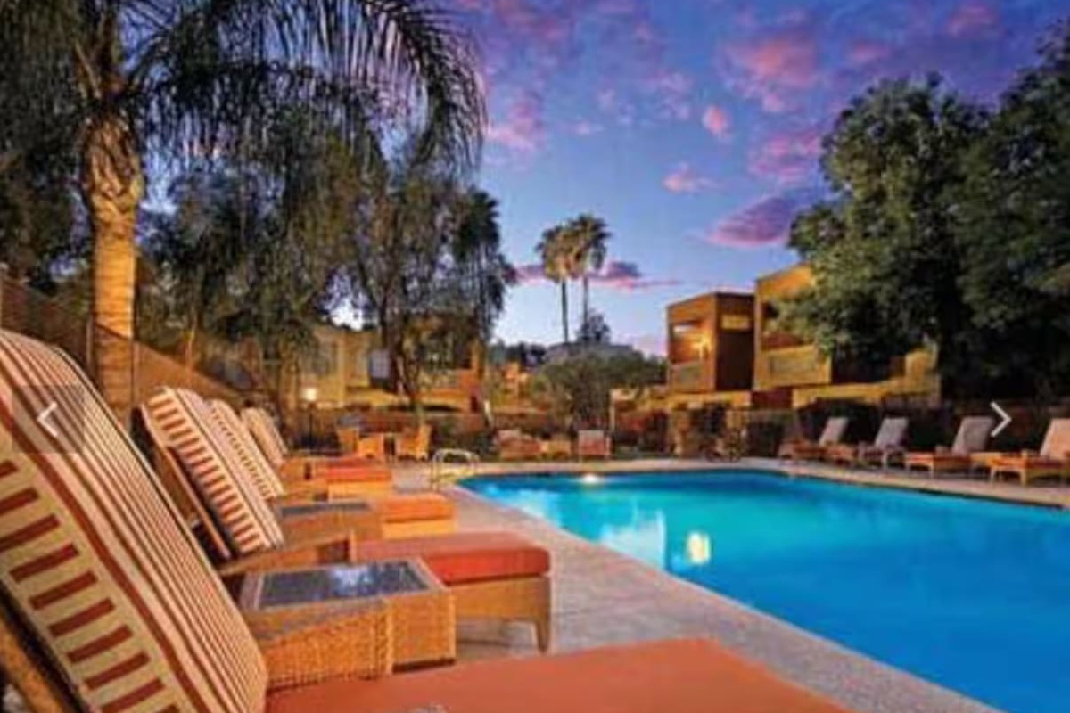 Wind down poolside as the sky turns pink — the perfect way to close out a day in the desert.