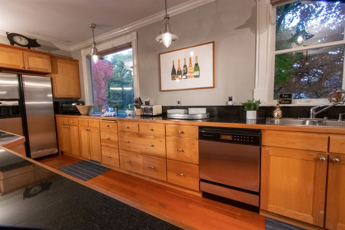 Incredibly well-equipped kitchen, thoughtfully set up for cooking meals meant to be shared.