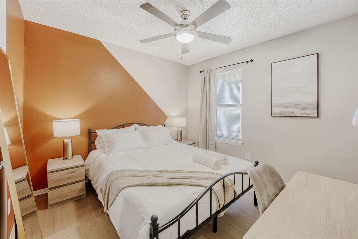 Warm and inviting bedroom with a modern touch and cozy accents.