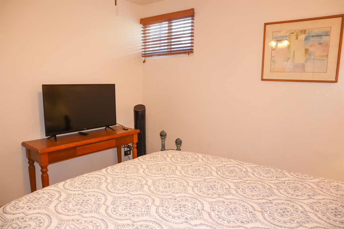 Circa Del Mar - Downstairs Bedroom 4 (North East) with a Queen bed with Wesley Allen headboard and open-toe foot posts.