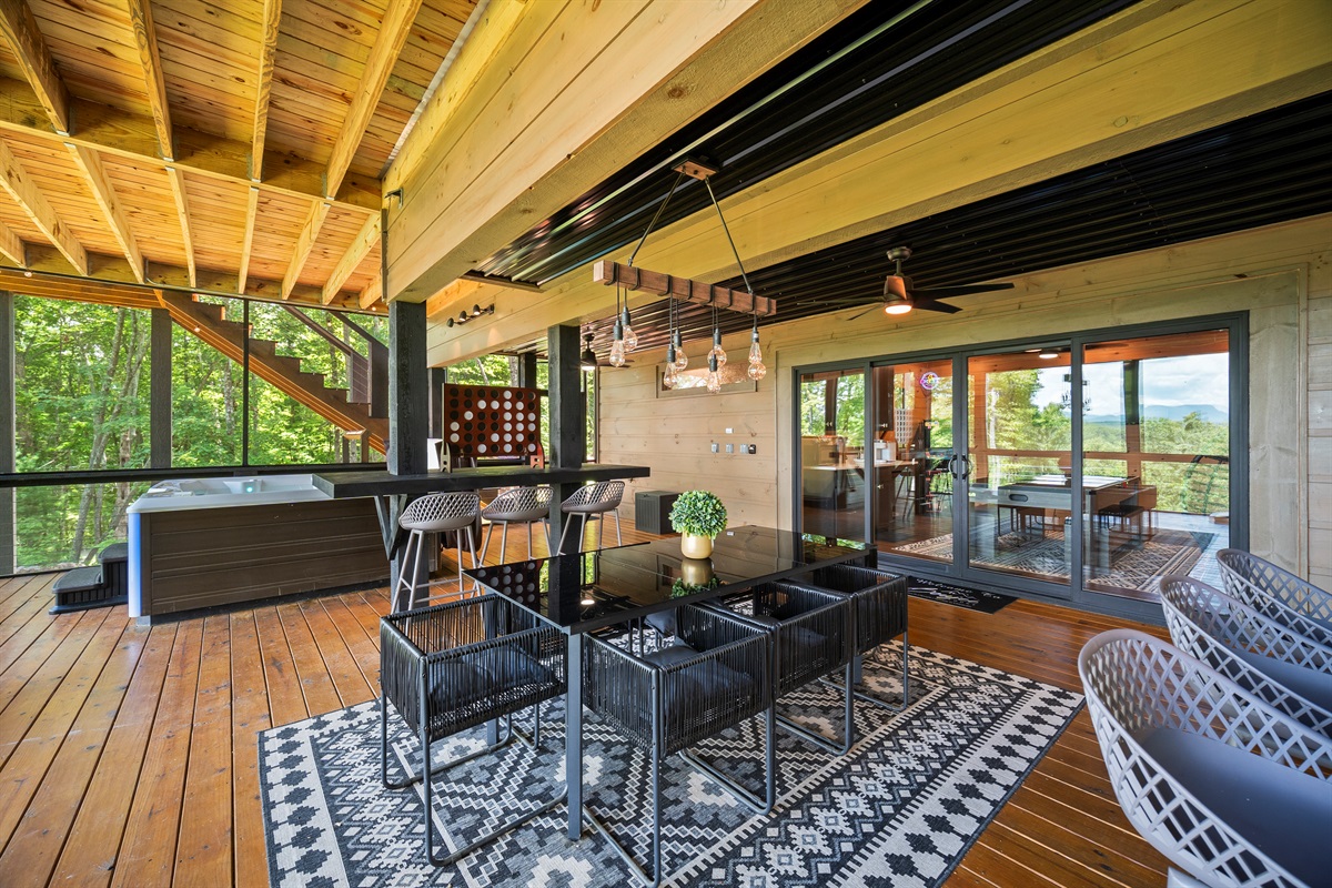 An elegant outdoor dining space perfect for sharing meals and making memories. Dinner tastes better with this backdrop.