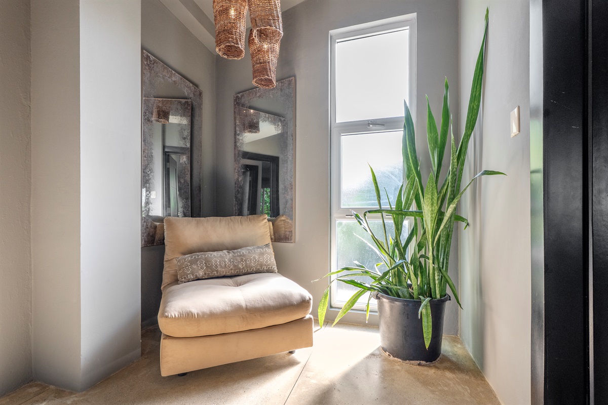 Cozy reading corner with natural light.