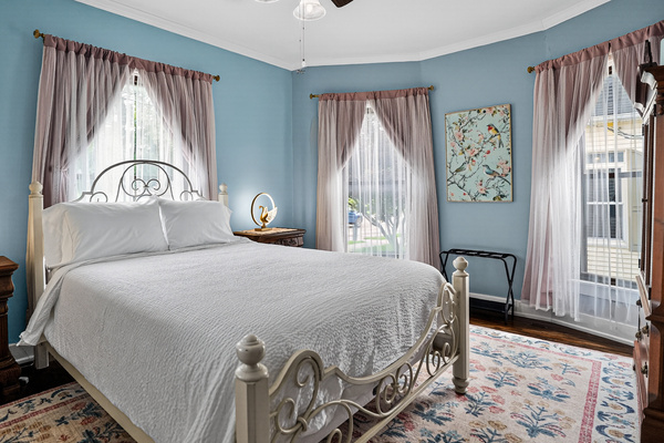 Light and airy. Memory foam queen mattress, plenty of pillows, blankets, and blackout curtains for a great night's sleep.