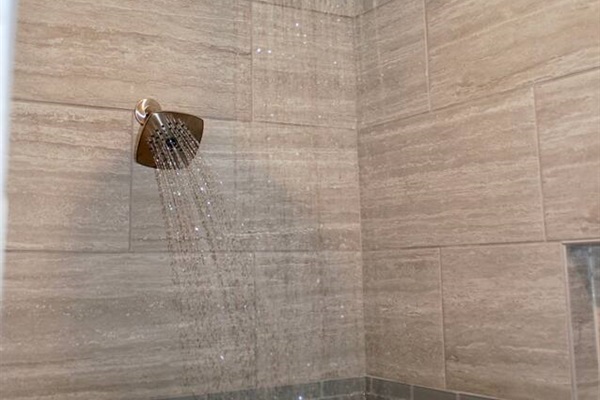 Enjoy the dual shower heads in this oversized walk-in shower!