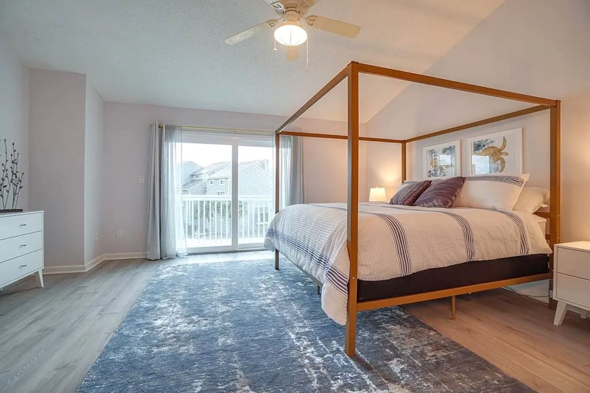 You've got a full suite to yourself up here &mdash; ample storage, a Smart TV, and your own private deck just steps from the king bed.