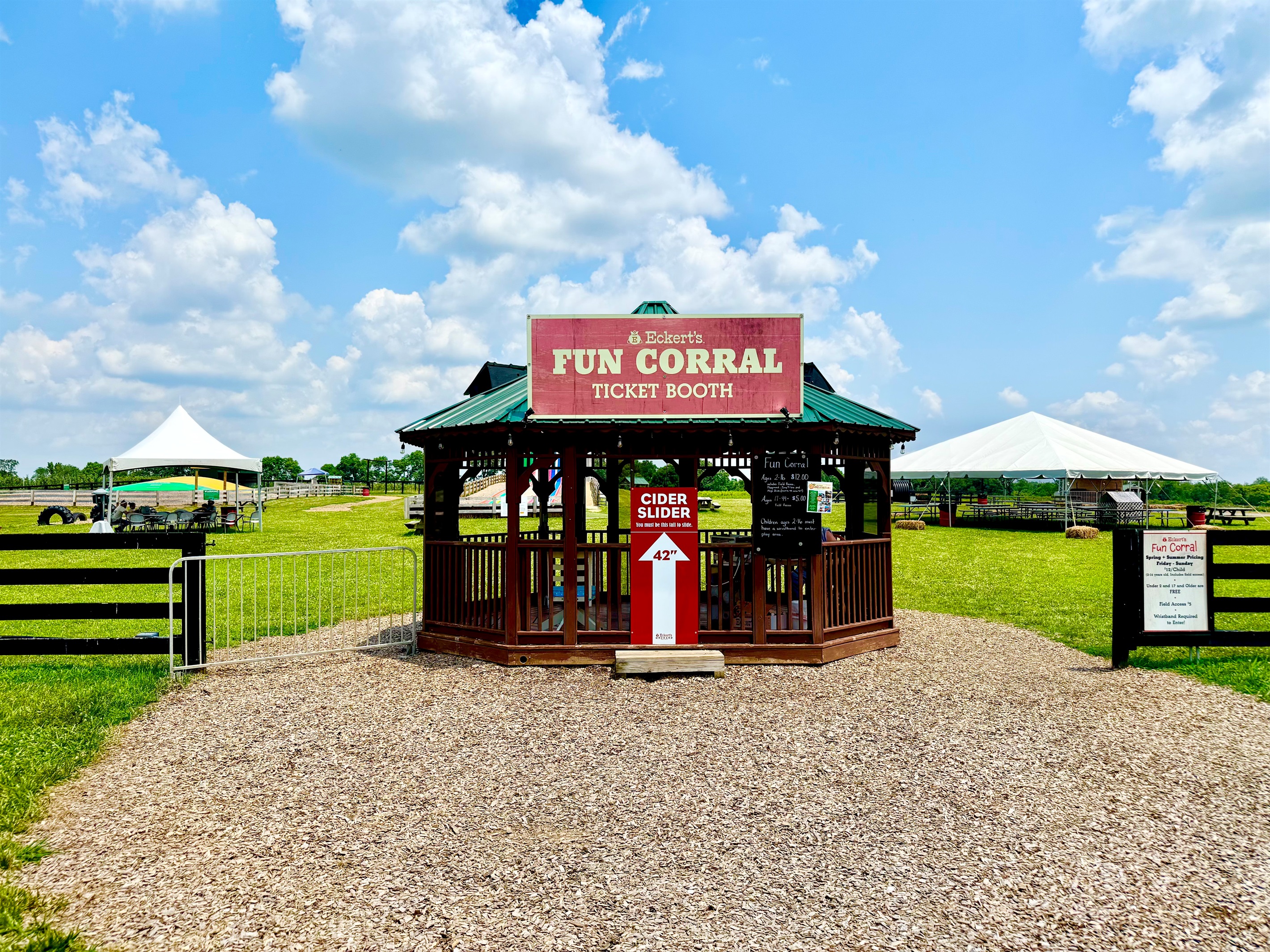 The Fun Corral at Eckert’s is a kid paradise—giant slides, tractor trikes, pig races, and endless smiles included.