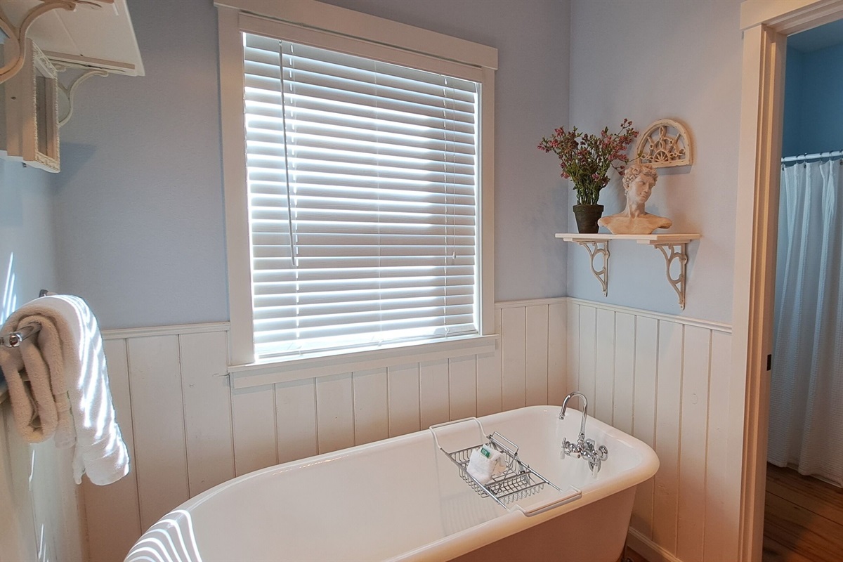 The clawfoot bathtub adds timeless charm and comfort to your stay.